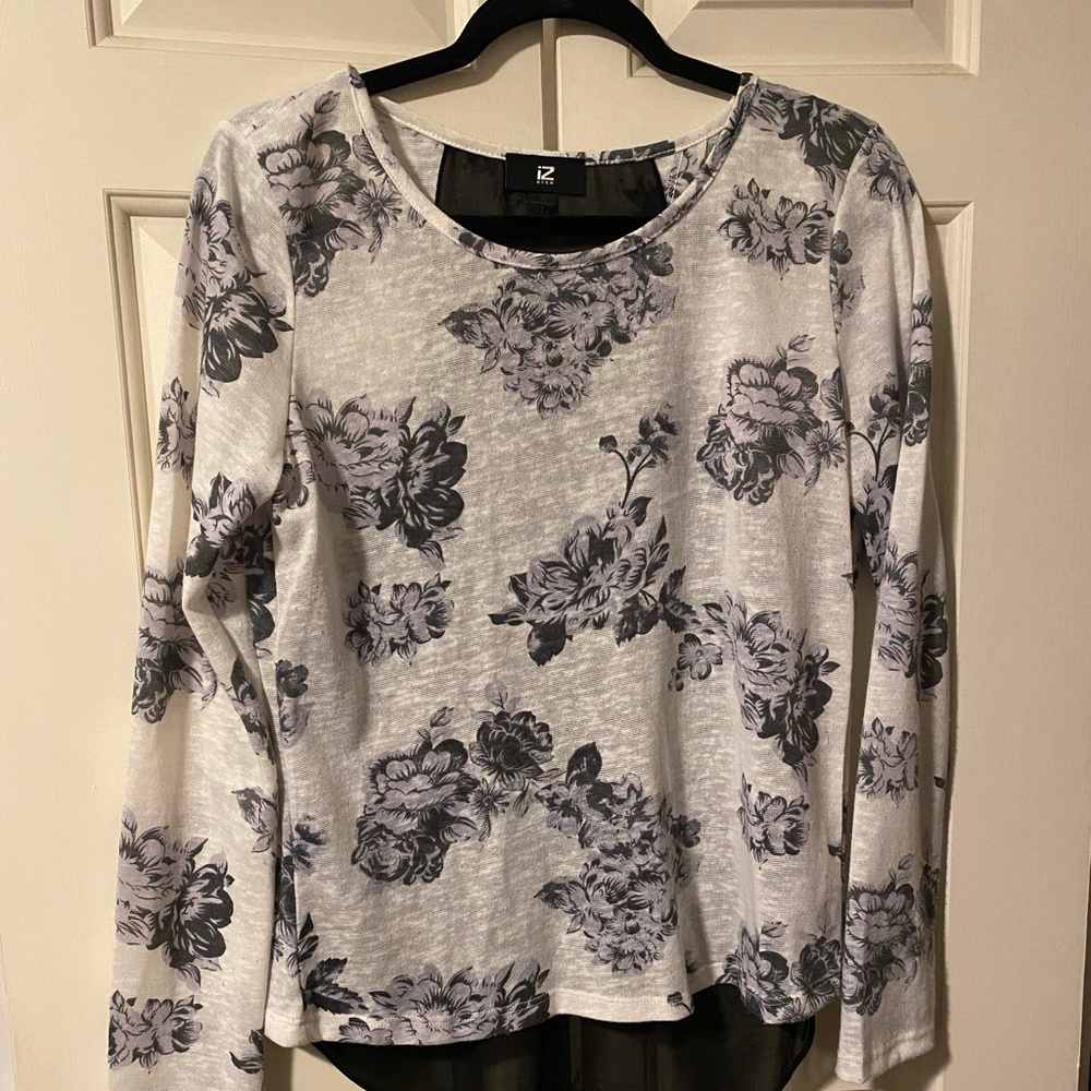 Junior’s large floral cut our back  blouse